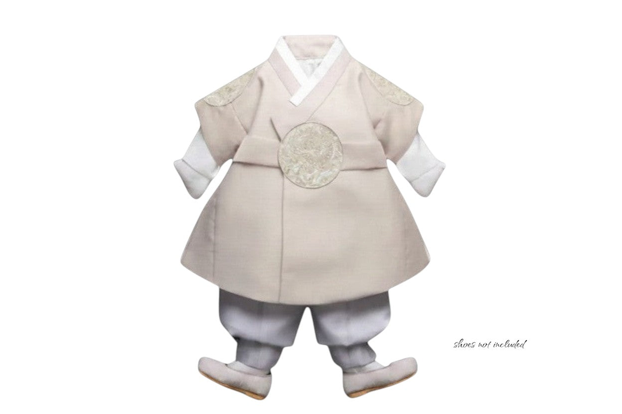 Little Seouls 100th Day boy's taupe hanbok set with white undershirt, vest, pants, and shoes. Features ornate embroidery on the vest.