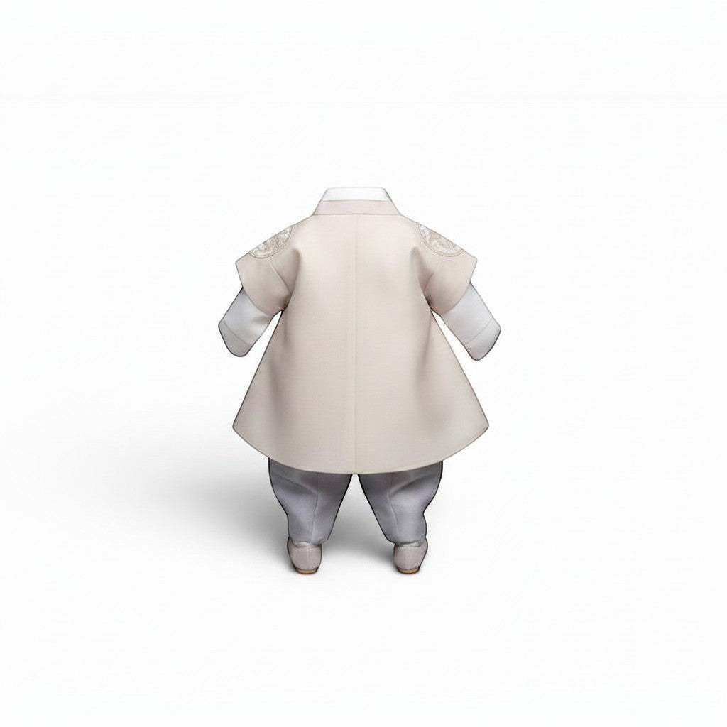 Little Seouls 100th Day boy taupe hanbok set with white shirt, vest, pants, and black hat. Features embroidered circular detail on back.