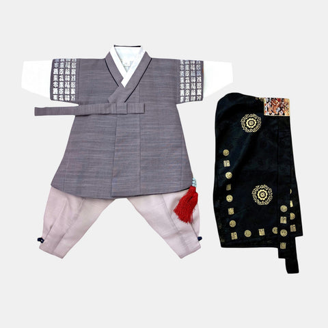 Little Seouls grey and white traditional Hangul hanbok for a 1st birthday, with pink pants and a black embroidered vest.