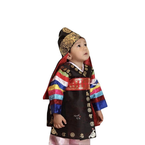 Little Seouls traditional black and gold dolbok prince hanbok for a 1st birthday. Features colorful sleeves and a red sash.