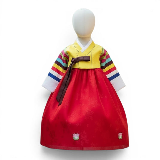 Little Seouls traditional yellow and red hanbok for a 1st birthday girl, featuring colorful striped sleeves and a red skirt with butterfly appliques.