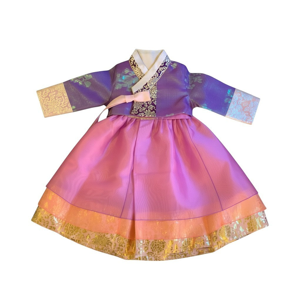 Little Seouls lavender and pink princess hanbok for a 1st birthday girl, featuring ornate gold trim and a pink bow.