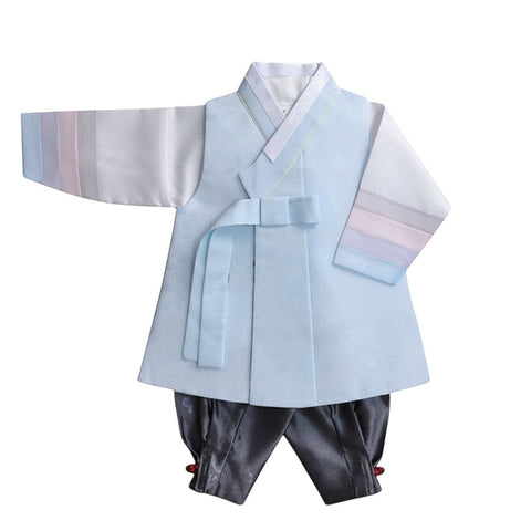 Little Seouls pastel blue and white 1st birthday boy hanbok with grey pants and pastel sleeve accents.