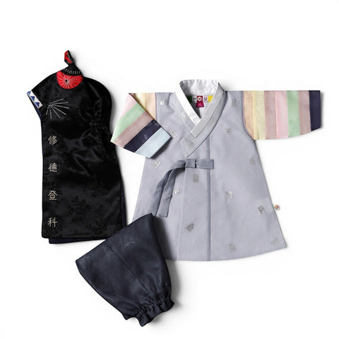 Little Seouls pastel grey hanbok for a 1st birthday boy, with rainbow striped sleeves and matching pants and hat.