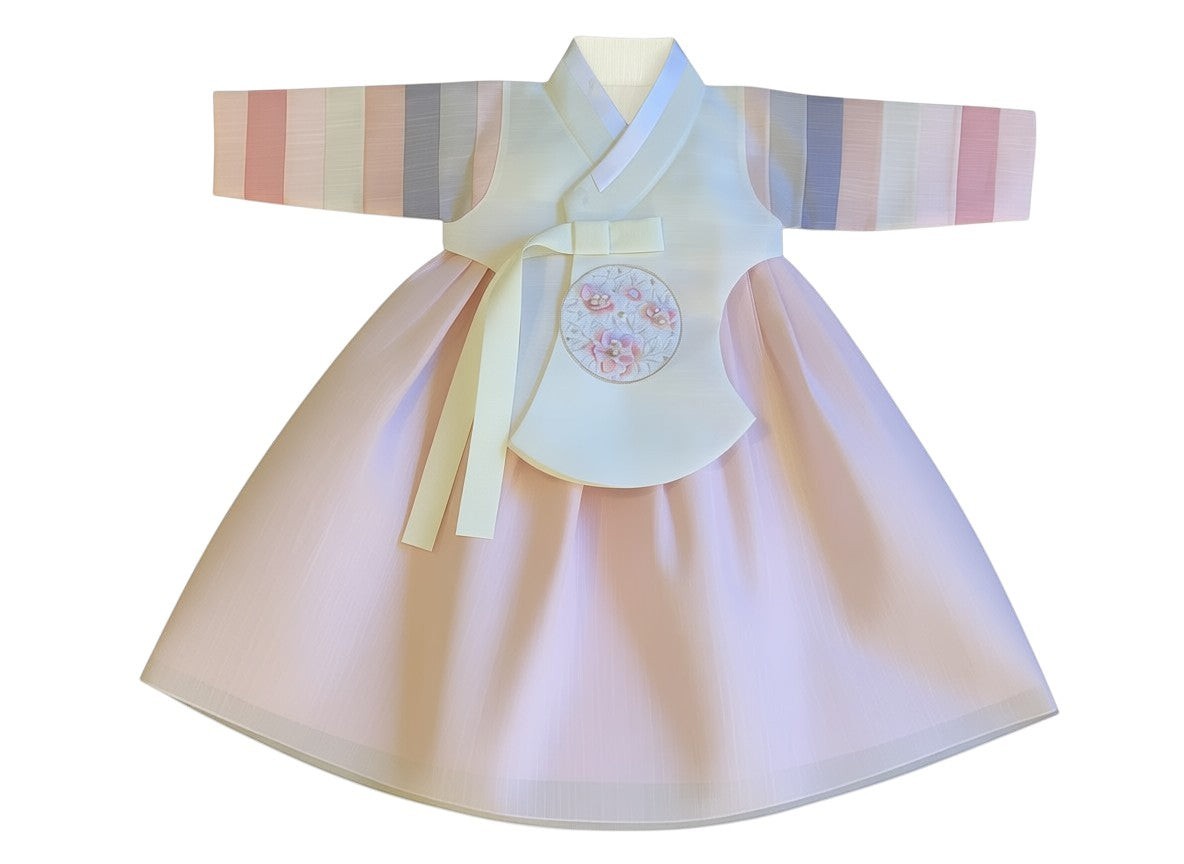 Little Seouls pastel pink organza skirt and cream hanbok top with striped sleeves and floral embroidery.