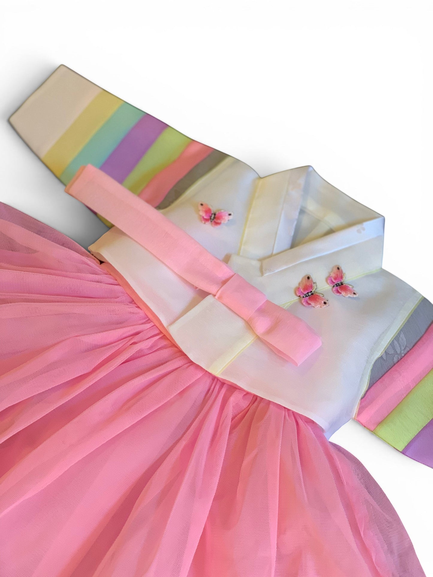Little Seouls light pink tulle skirt hanbok with pastel striped sleeves and butterfly details for a 100th day celebration.