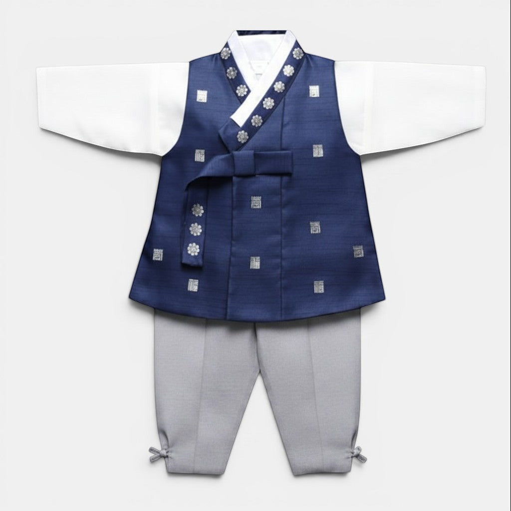 Little Seouls Traditional Korean Baby Hanbok Set: white top, navy vest with silver floral & square patterns, ribbon tie, grey pants. For celebrations.