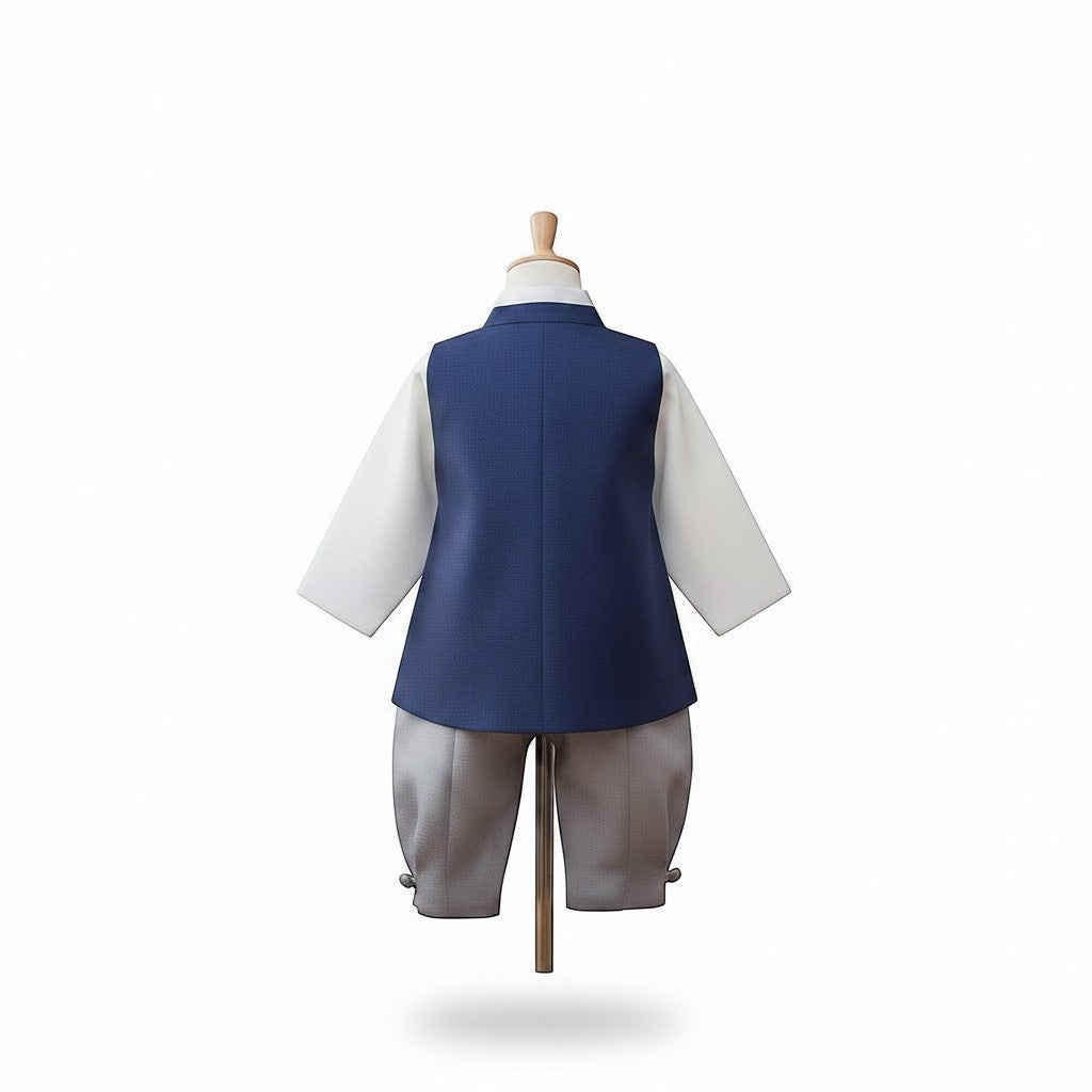 Little Seouls 100th Day boy's traditional navy blue hanbok with white shirt, grey pants, and patterned vest.