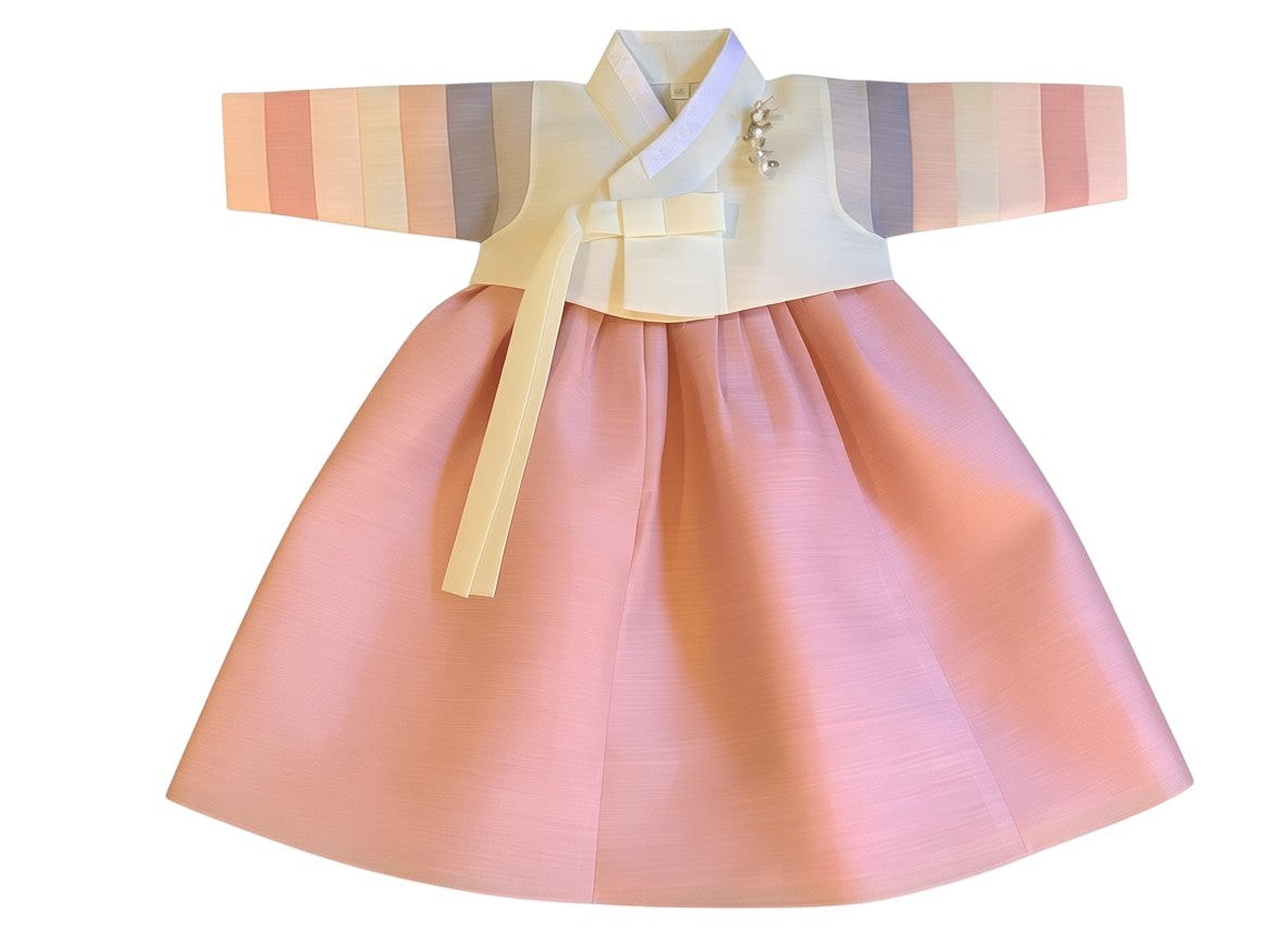 Little Seouls pink silk hanbok for 100th day celebration, with pastel striped sleeves and pearl embellishment.
