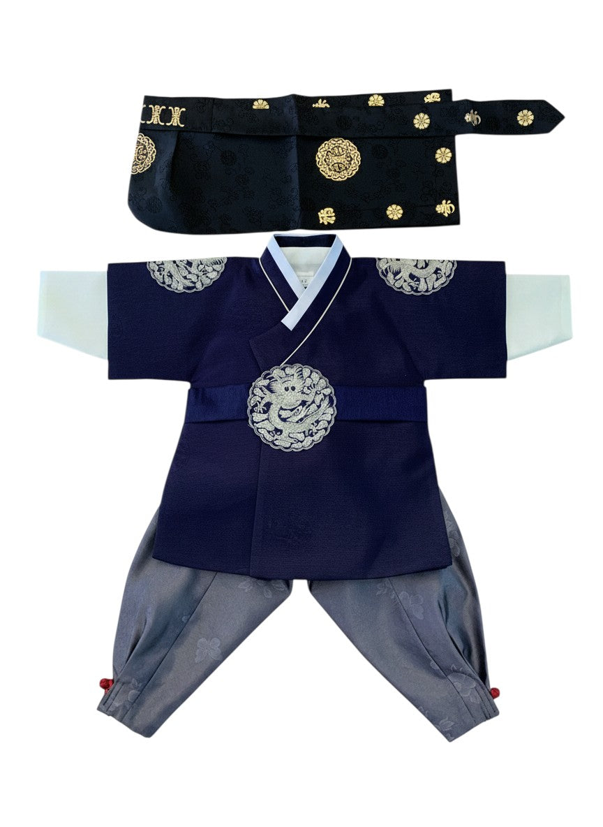 Little Seouls navy blue royal king style hanbok for a 1st birthday boy, includes shirt, pants, and headpiece.